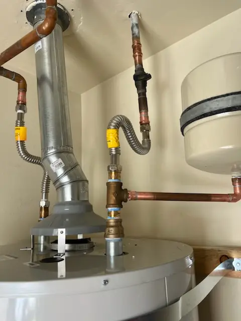 Water heater installation and plumbing repair in Spruces